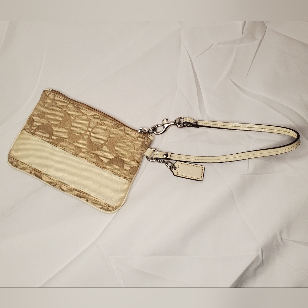 Coach signature ivory and brown wristlet